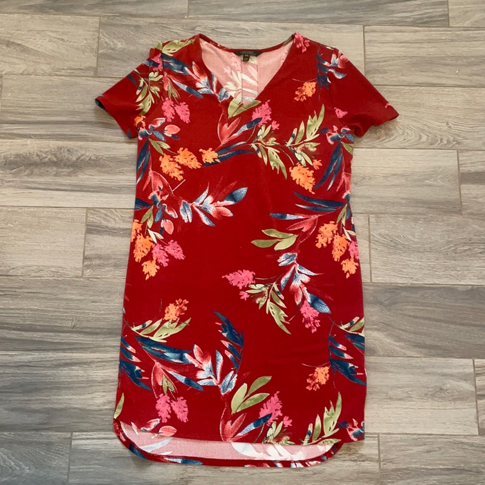 Tunic floral dress great to wear with leggings. Longer in the back.